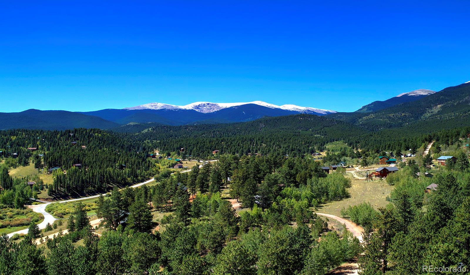 117 Tall Timber Lane Bailey, CO 80421 - Photo 37 of 37 a view of a town with mountains in the background