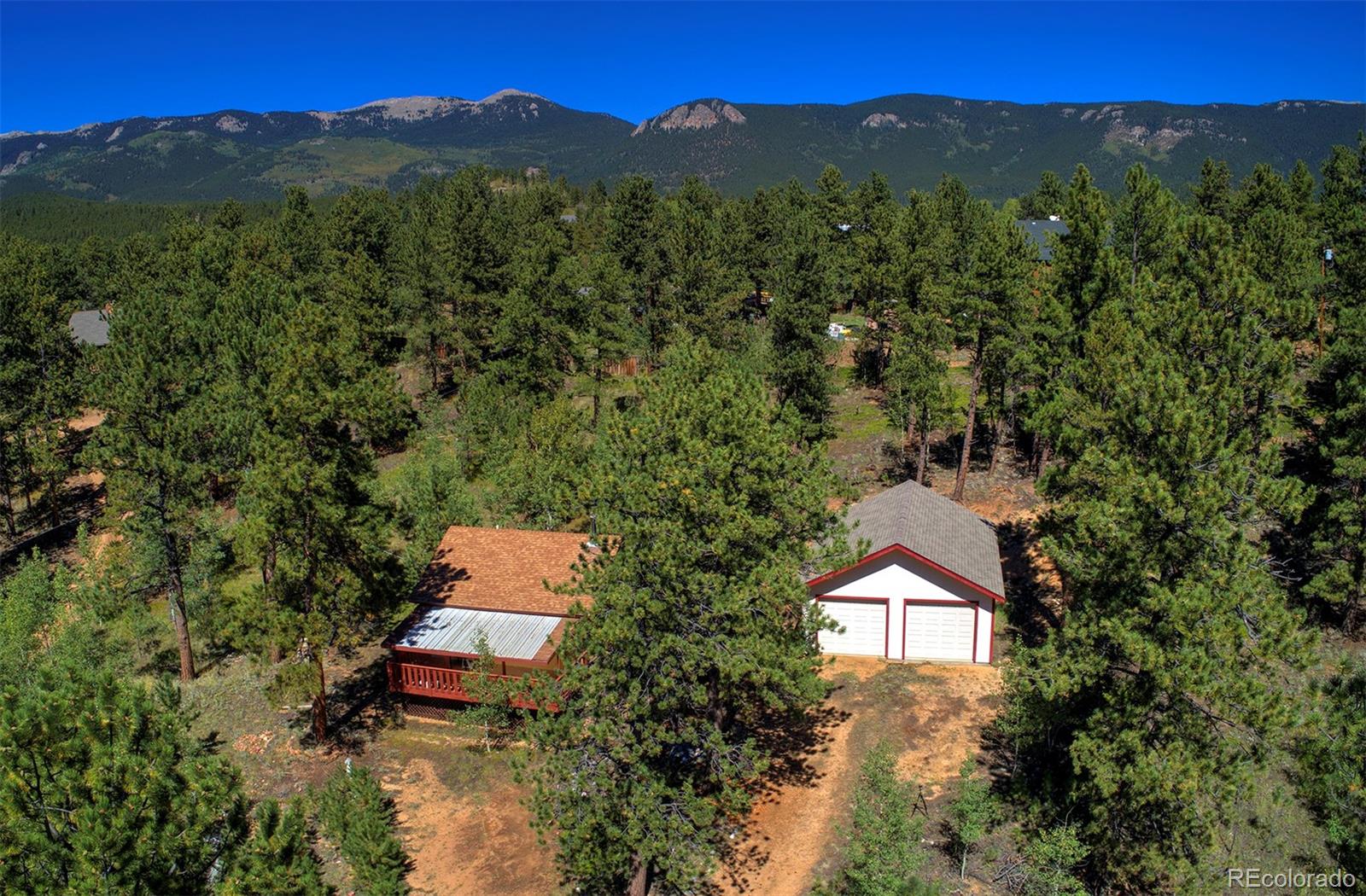 117 Tall Timber Lane Bailey, CO 80421 - Photo 4 of 37 an aerial view of a house with mountain view