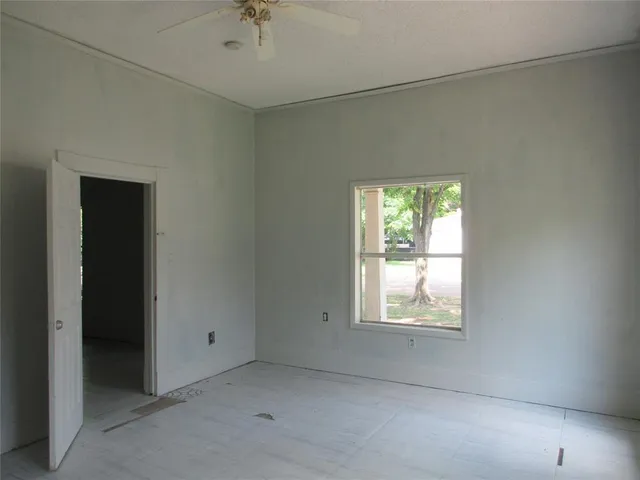 an empty room with windows