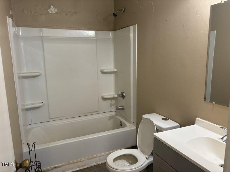 4724 Hoyle Drive Raleigh, NC 27604 - Photo 6 of 11 a bathroom with a sink toilet and shower
