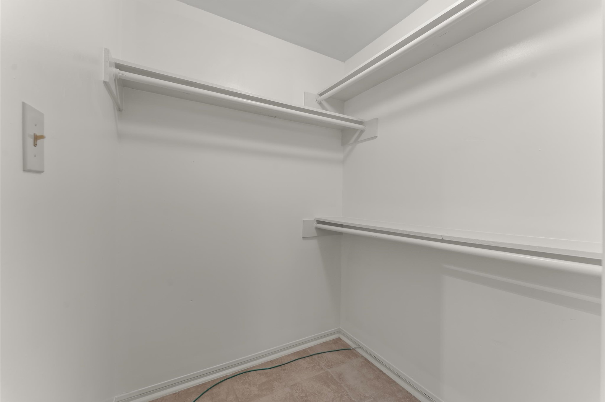 7311 17th Green Drive Humble, TX 77346 - Photo 19 of 32 a view of an empty walk in closet