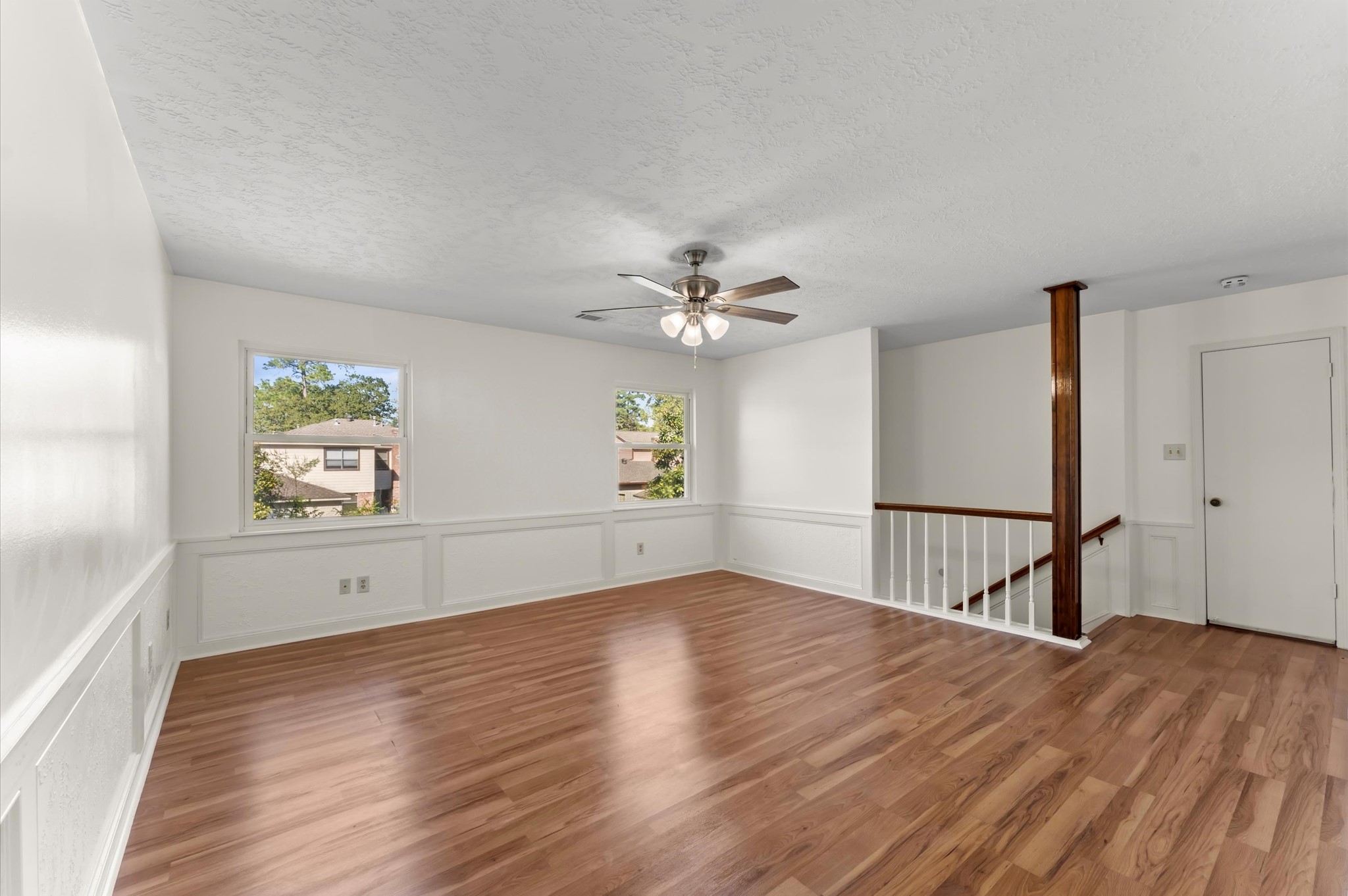 7311 17th Green Drive Humble, TX 77346 - Photo 20 of 32 a view of empty room with wooden floor