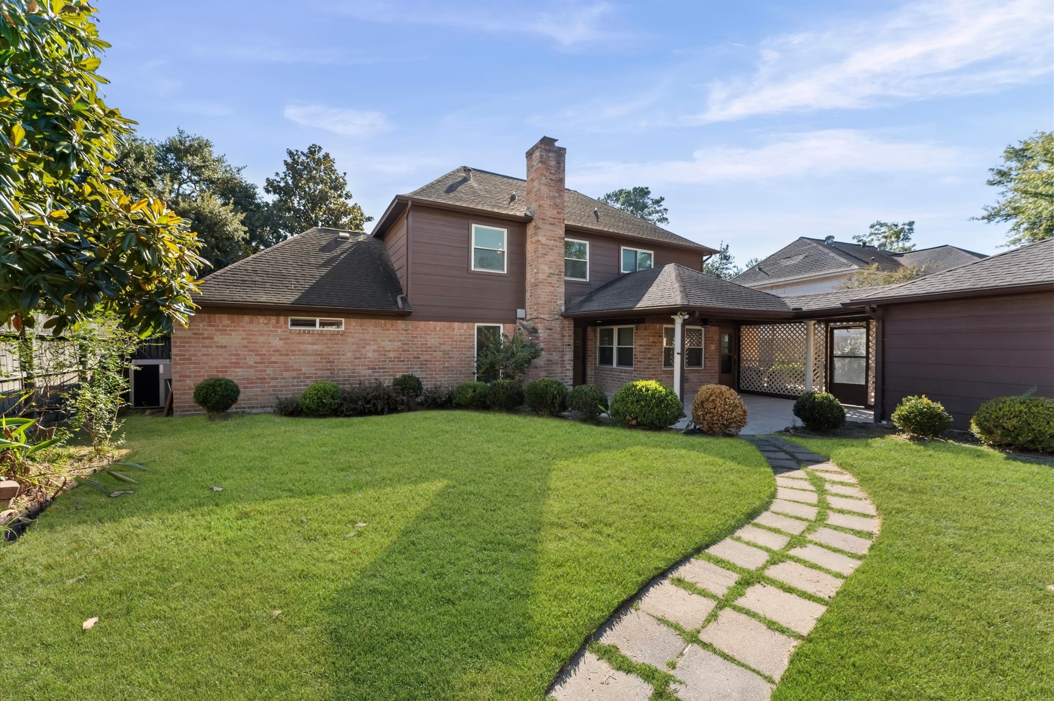 7311 17th Green Drive Humble, TX 77346 - Photo 27 of 32 a front view of a house with a yard