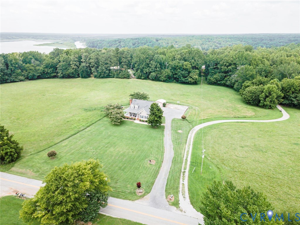 827 Sutherland Road Church Road, VA 23833 - Photo 43 of 51 Expansive green acreage with a distant body of wat
