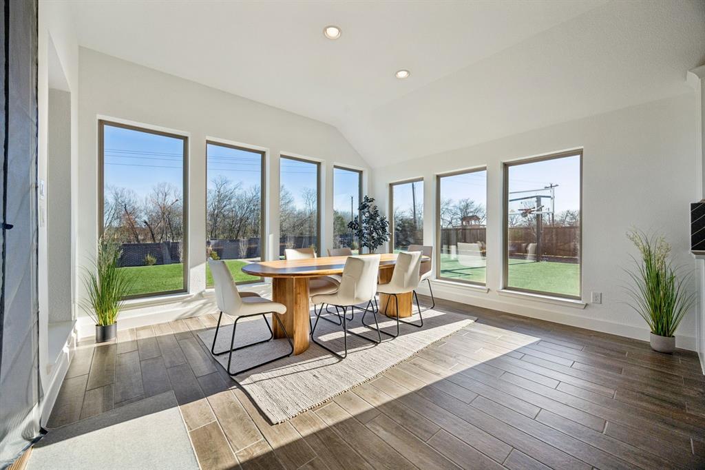 1551 Ripasso Way McLendon-Chisholm, TX 75032 - Photo 12 of 39 a living room with a large window and a table