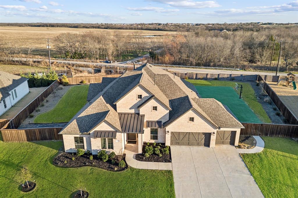 1551 Ripasso Way McLendon-Chisholm, TX 75032 - Photo 33 of 39 an aerial view of a house with outdoor space and lake view