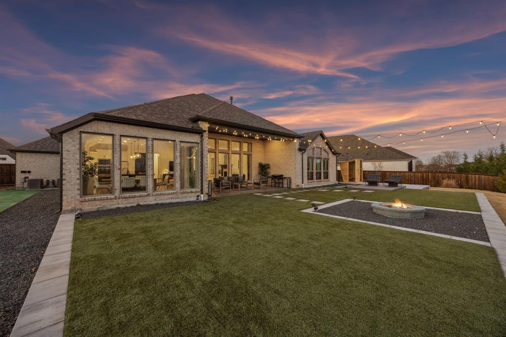 1551 Ripasso Way McLendon-Chisholm, TX 75032 - Photo 34 of 39 a view of outdoor space yard and swimming pool