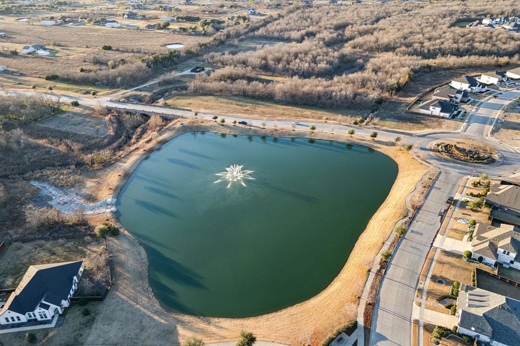 1551 Ripasso Way McLendon-Chisholm, TX 75032 - Photo 37 of 39 a view of a swimming pool with outdoor seating and plants
