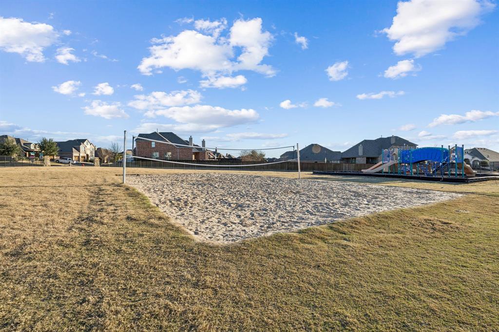 1551 Ripasso Way McLendon-Chisholm, TX 75032 - Photo 39 of 39 a view of an ocean and beach