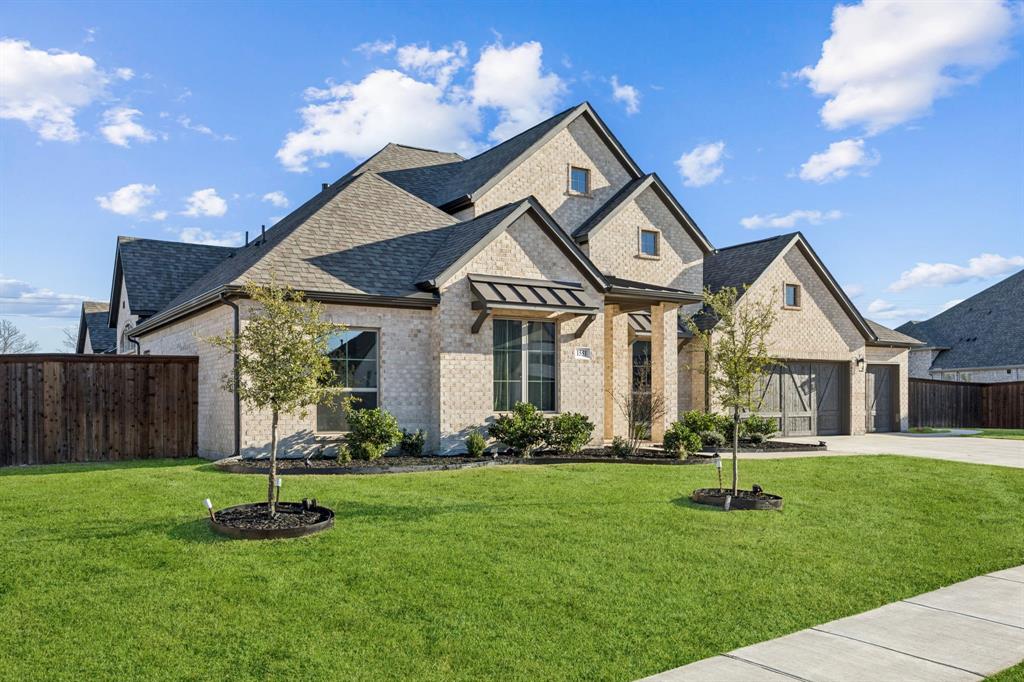 1551 Ripasso Way McLendon-Chisholm, TX 75032 - Photo 5 of 39 a front view of a house with a yard