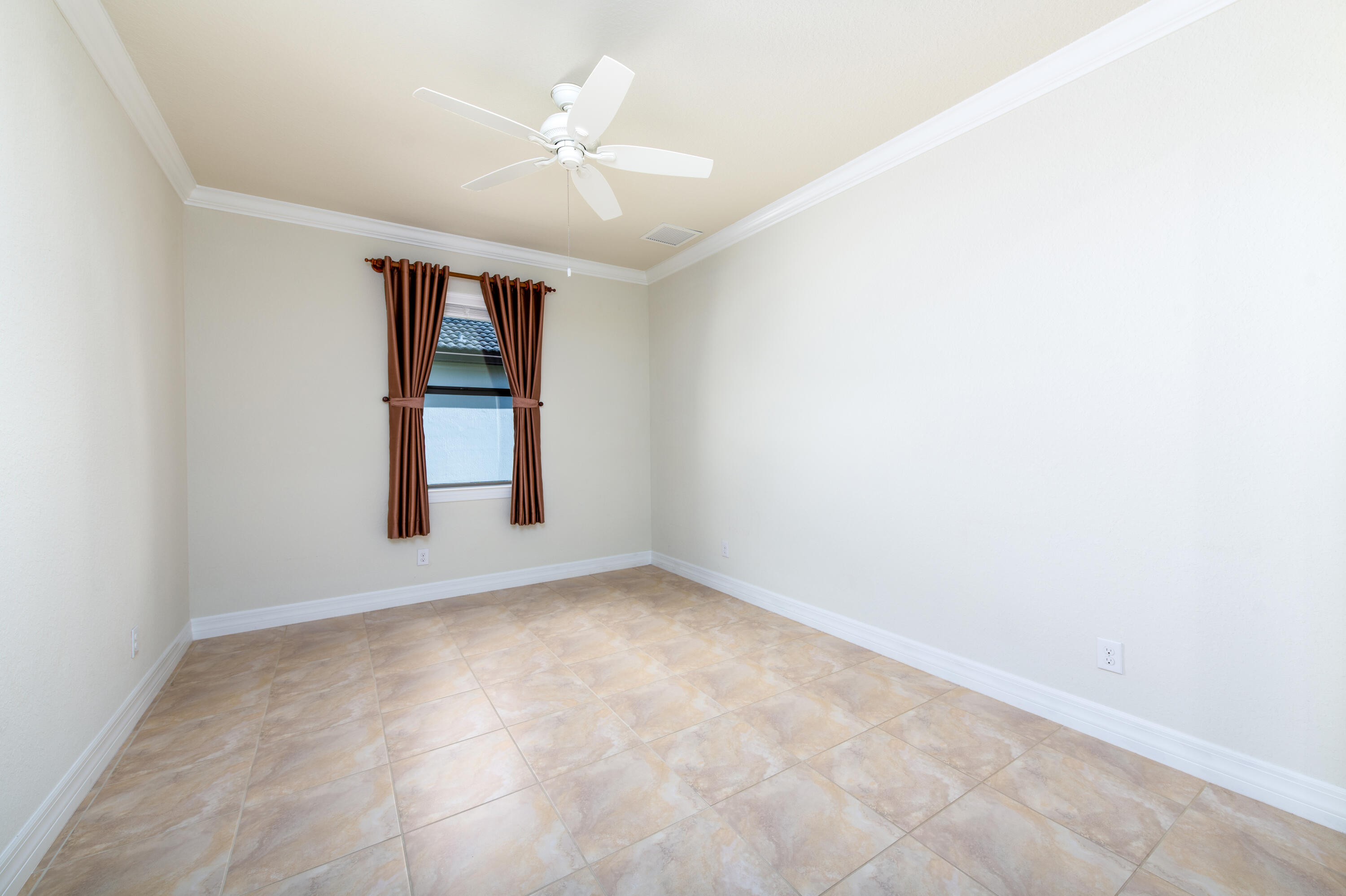 739 Southeast Villandry Way Port St. Lucie, FL 34984 - Photo 23 of 51 an empty room with windows and closet