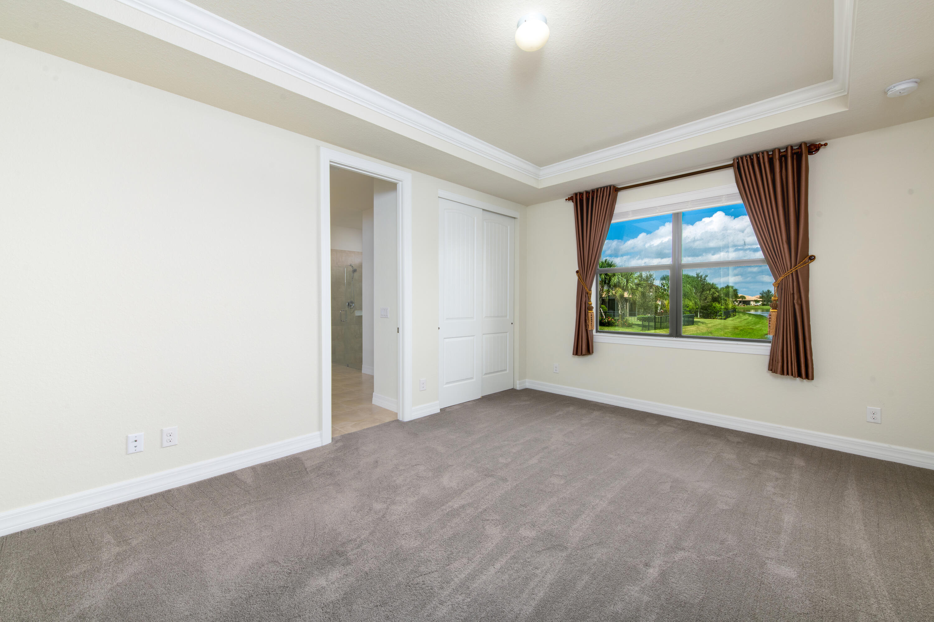 739 Southeast Villandry Way Port St. Lucie, FL 34984 - Photo 41 of 51 an empty room with windows