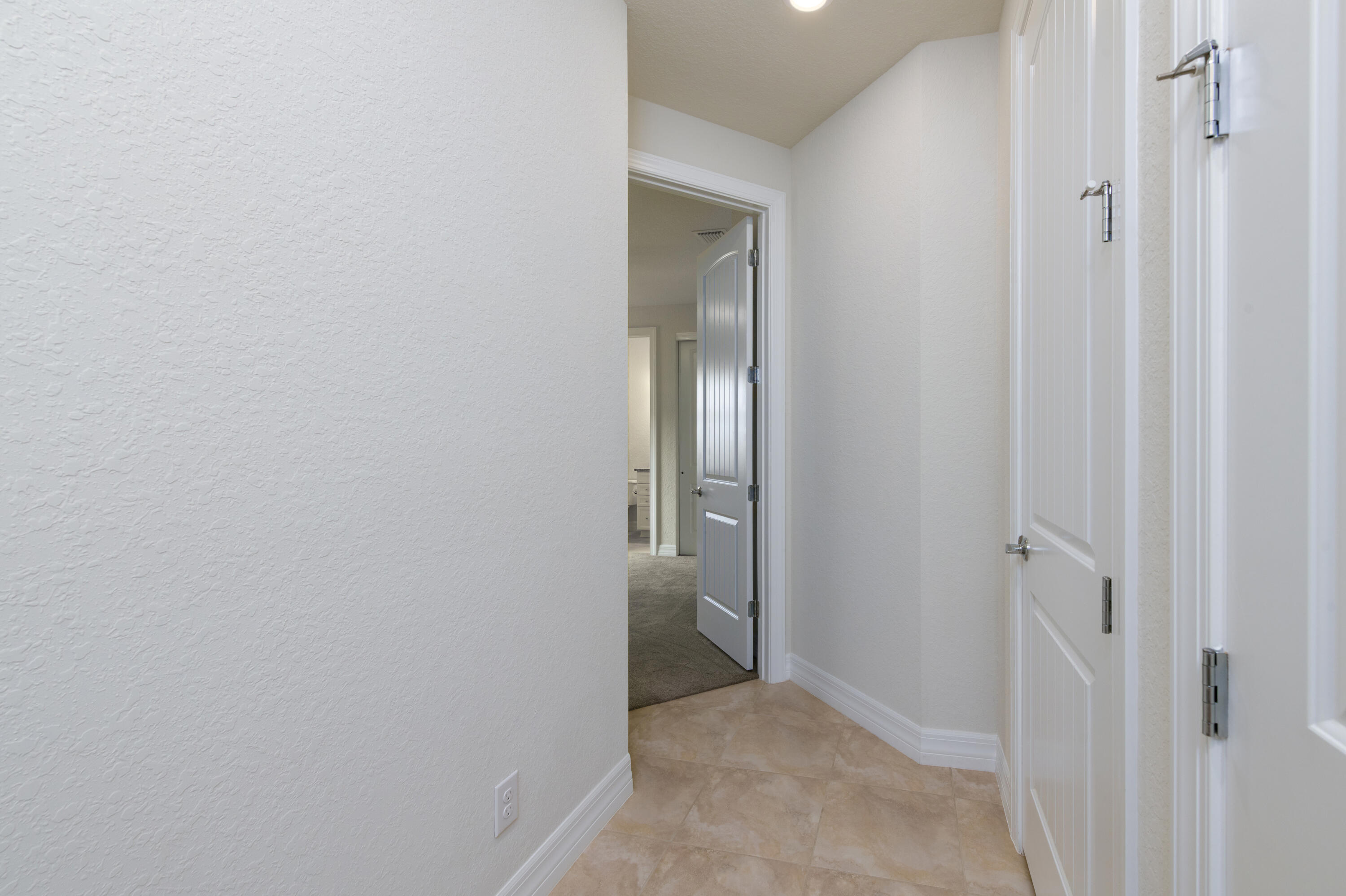 739 Southeast Villandry Way Port St. Lucie, FL 34984 - Photo 48 of 51 a view of an empty room and closet