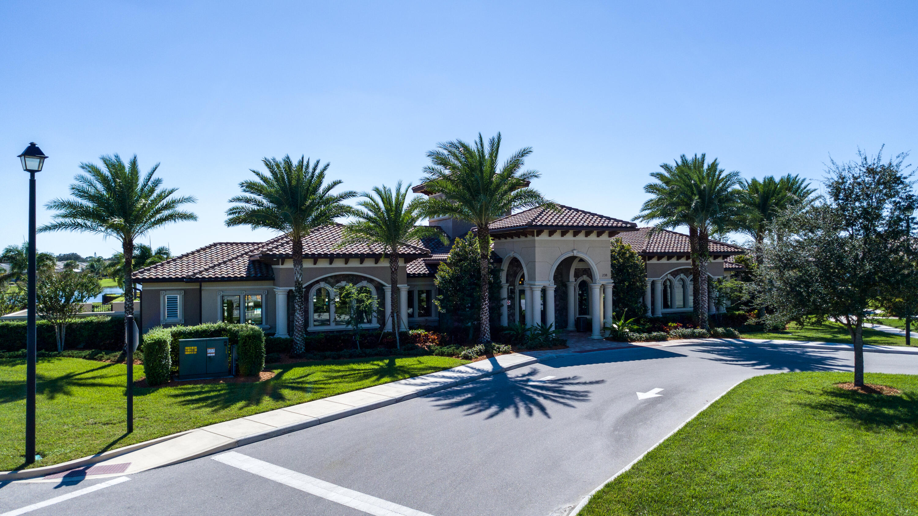 739 Southeast Villandry Way Port St. Lucie, FL 34984 - Photo 5 of 51 a front view of house with yard and green space