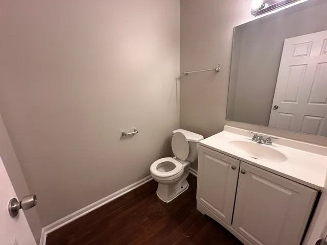 a bathroom with a sink and toilet