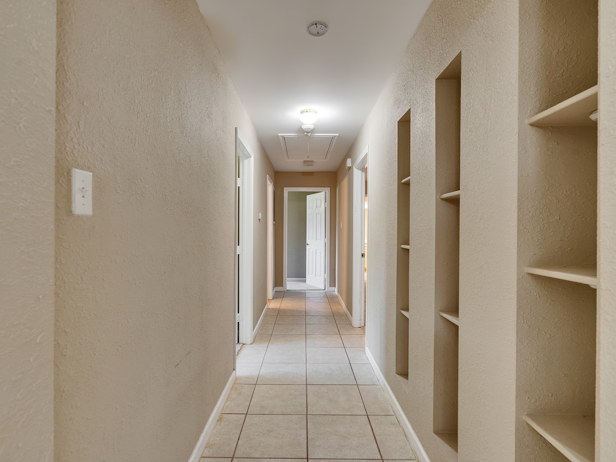 603 Casper Court Spring, TX 77373 - Photo 24 of 31 hallway with storage for books, games or whatever you would like