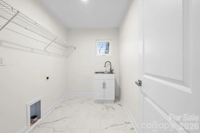 a bathroom with a sink and toilet