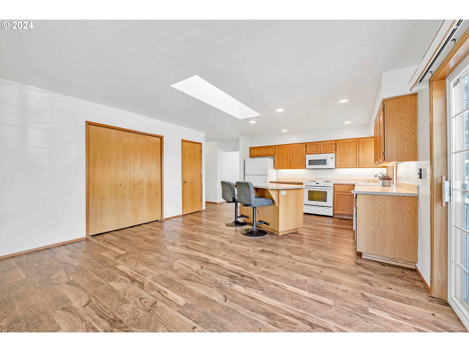 509 South 68th Place Springfield, OR 97478 - Photo 19 of 48 a view of kitchen with wooden floor