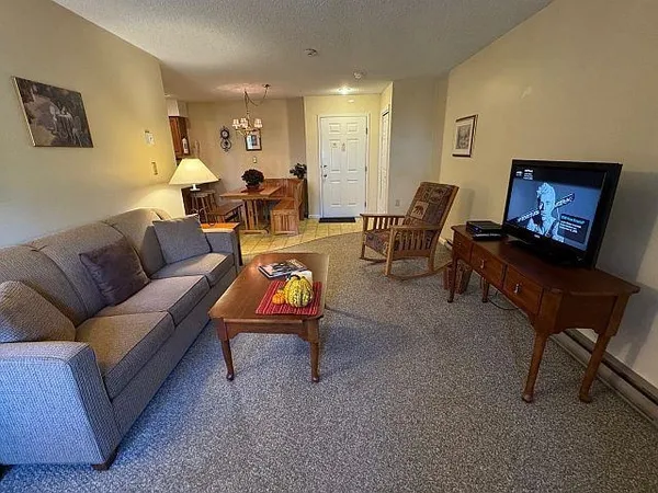 $298,600 | 227 Main Street, Unit 235, Lincoln, NH 03251