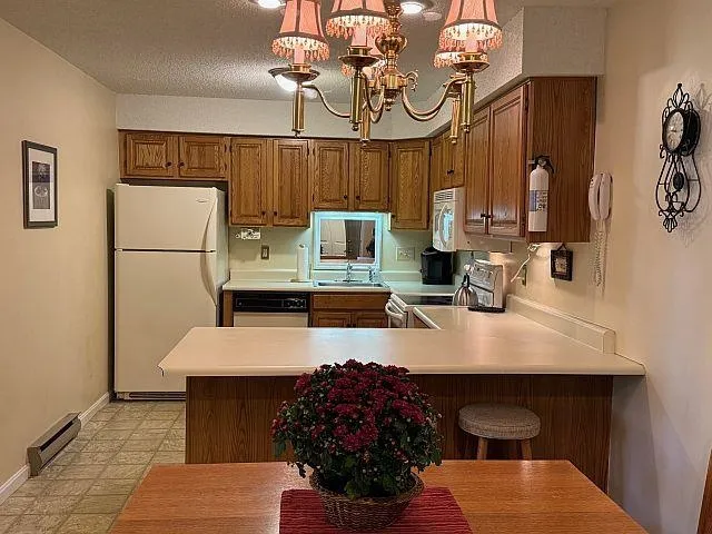 $298,600 | 227 Main Street, Unit 235, Lincoln, NH 03251