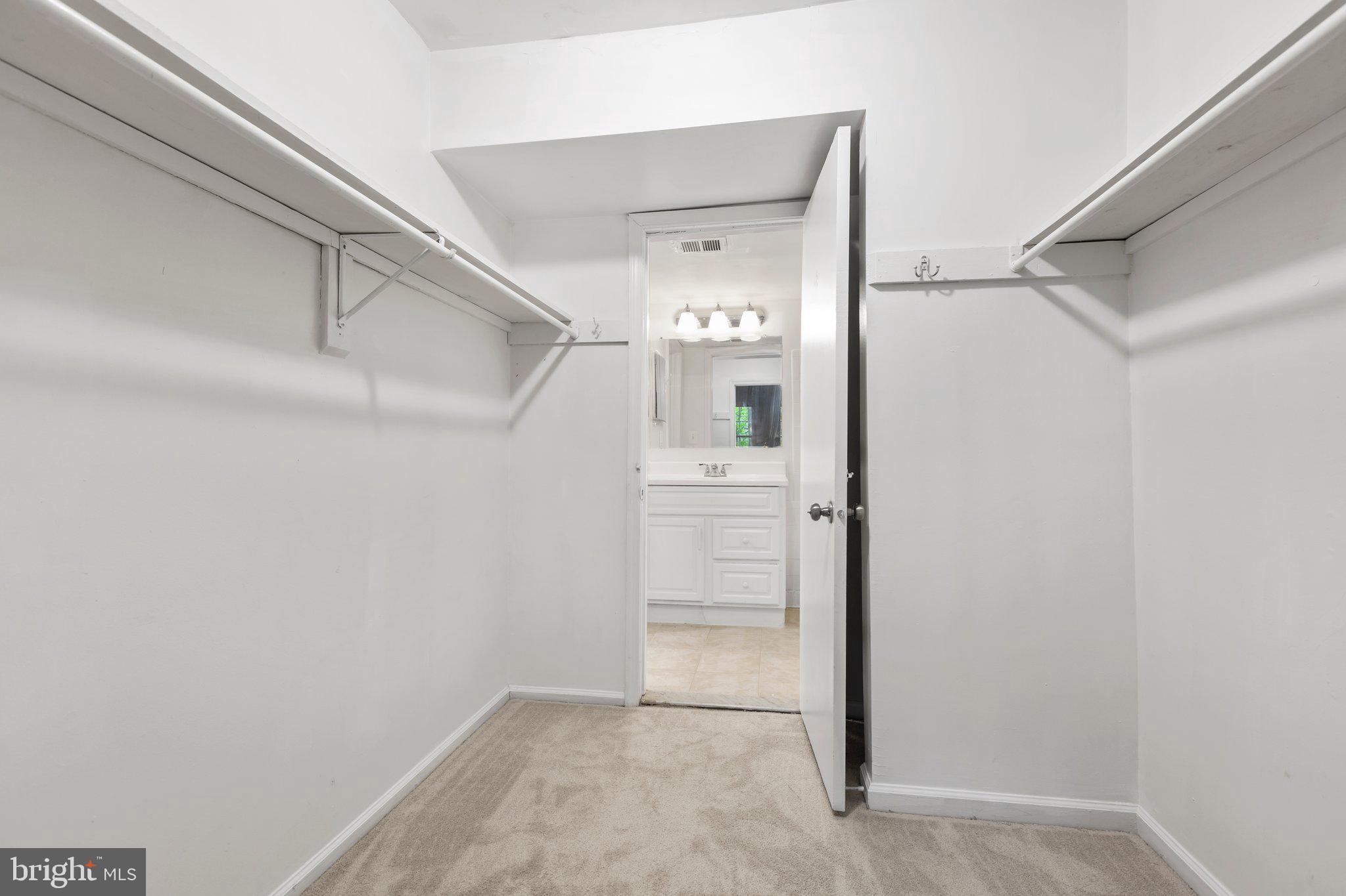 5902 Kingsford Road, Unit 406 Springfield, VA 22152 - Photo 20 of 41 Walk in Closet in Primary Bedroom