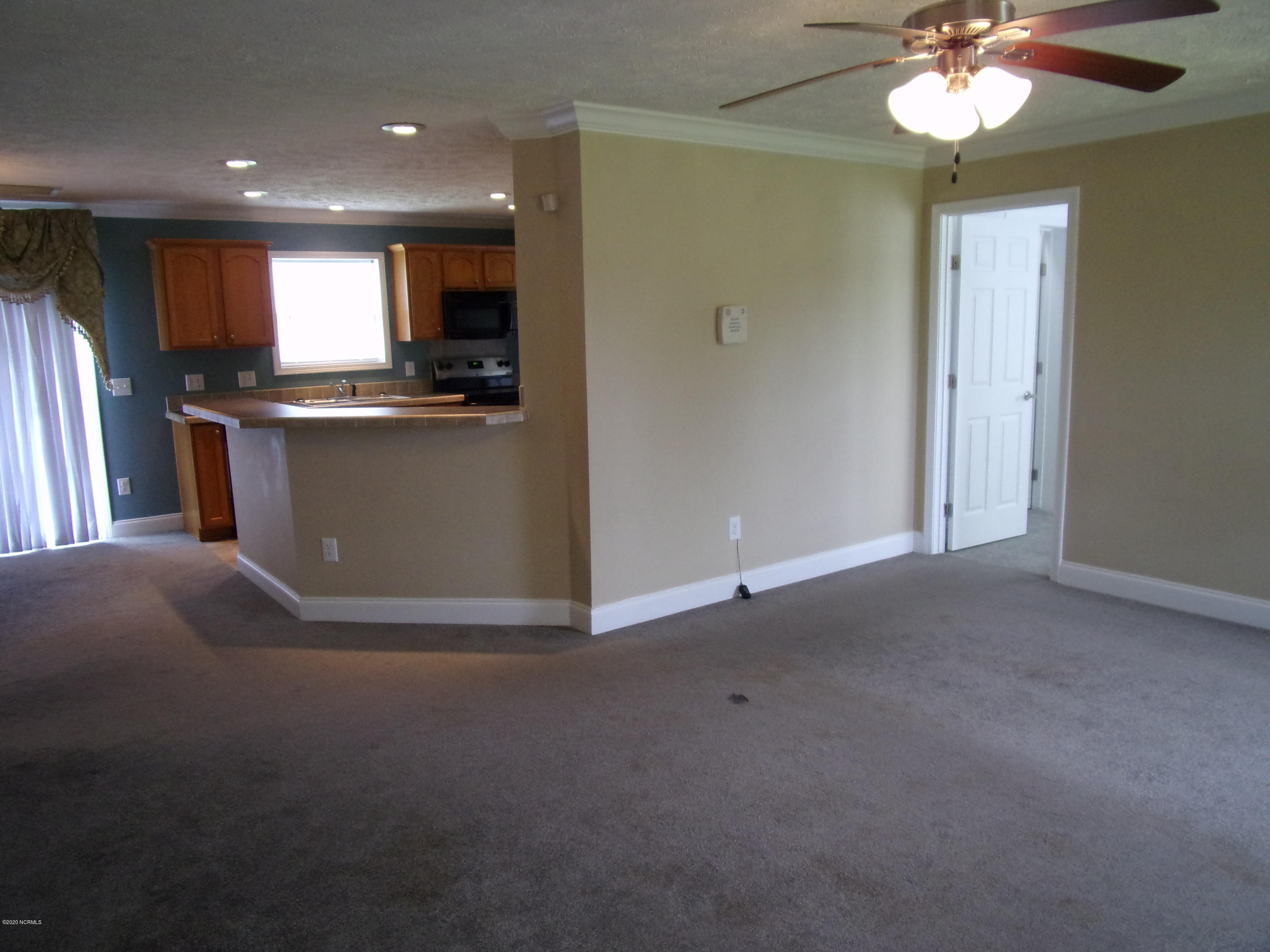 2568 Union Chapel Road Currie, NC 28435 - Photo 6 of 16 Living room toward Kitchen/Dining and Master Suite.