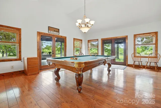 a bedroom with a bed and a night stand