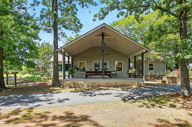 a kitchen with stainless steel appliances granite countertop a stove a refrigerator and a refrigerator