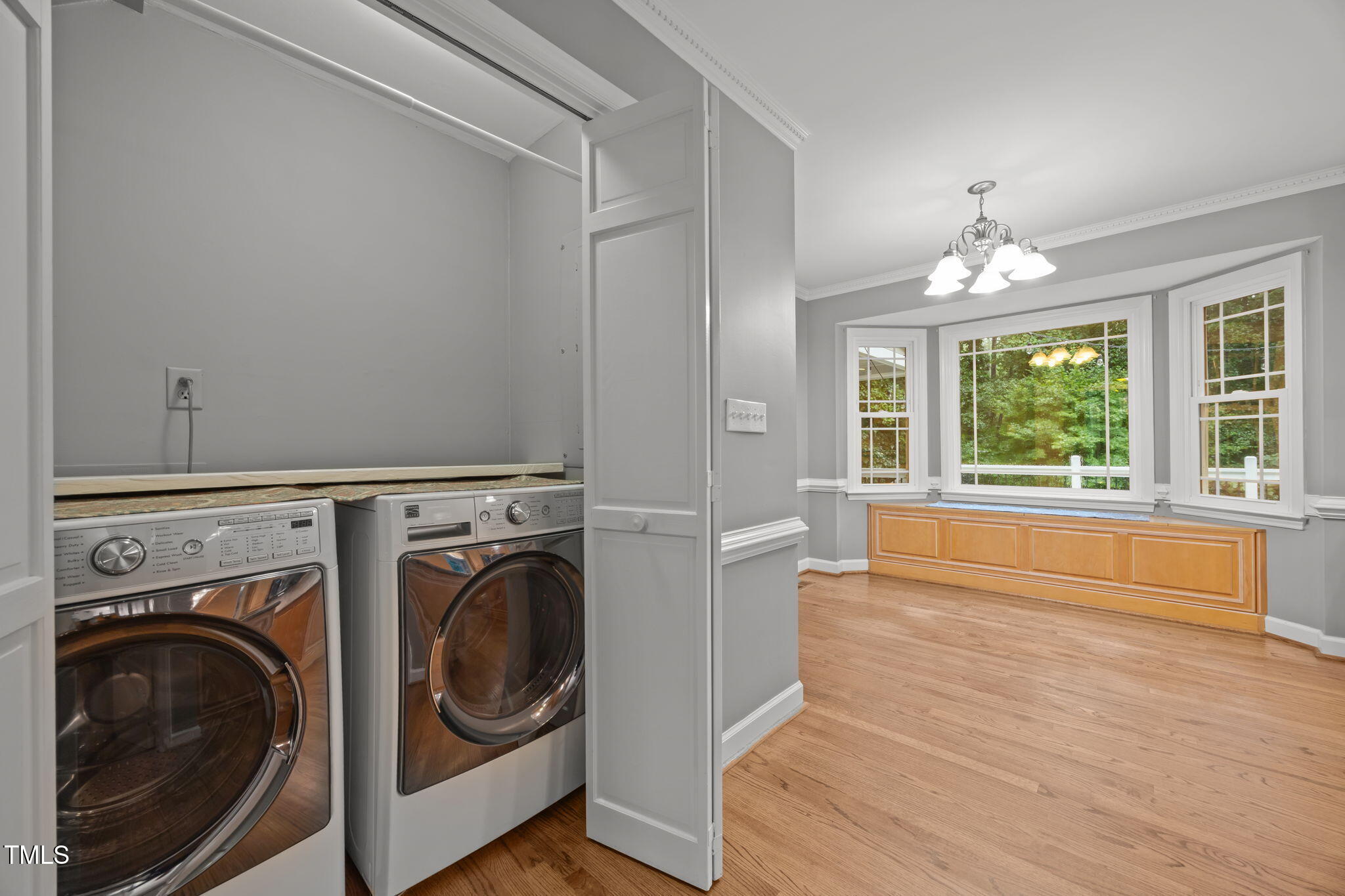 2204 Corberrie Lane Raleigh, NC 27613 - Photo 20 of 39 a view of a hallway with washer and dryer
