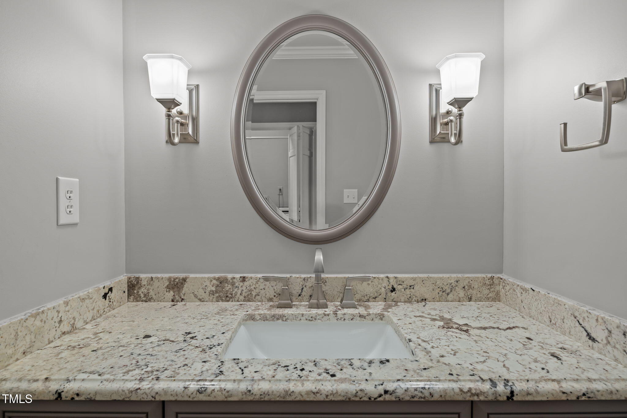2204 Corberrie Lane Raleigh, NC 27613 - Photo 21 of 39 a bathroom with a granite countertop sink and a mirror