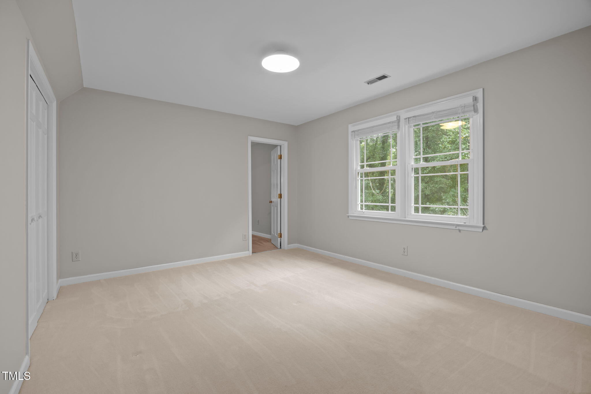 2204 Corberrie Lane Raleigh, NC 27613 - Photo 30 of 39 an empty room with windows