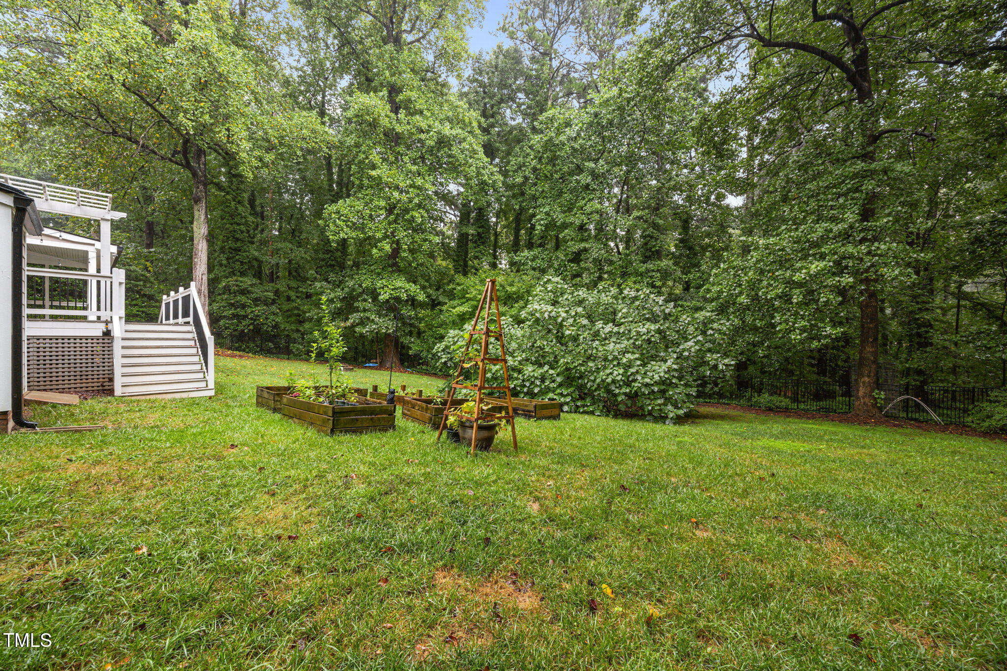 2204 Corberrie Lane Raleigh, NC 27613 - Photo 35 of 39 a view of a backyard with sitting area
