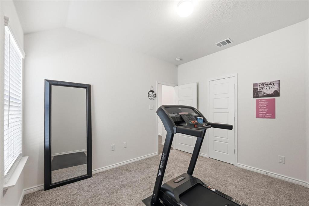 762 Fort Lane Fate, TX 75189 - Photo 29 of 36 Second bedroom used as exercise room