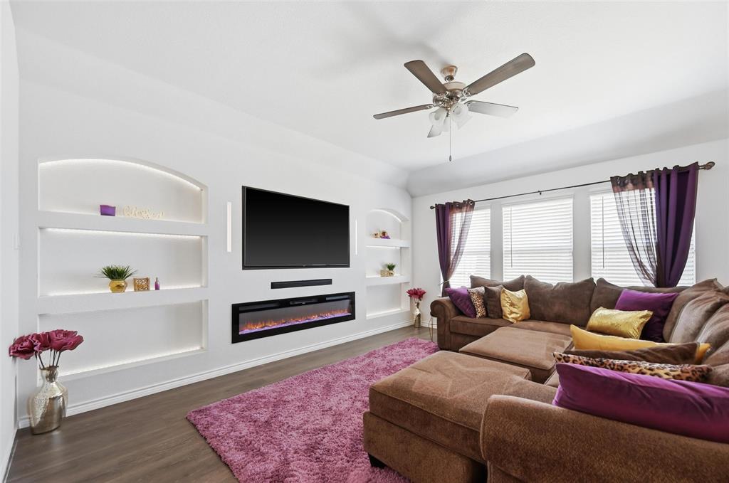 762 Fort Lane Fate, TX 75189 - Photo 4 of 36 The fireplace is custom not standard to the community or floorpan.