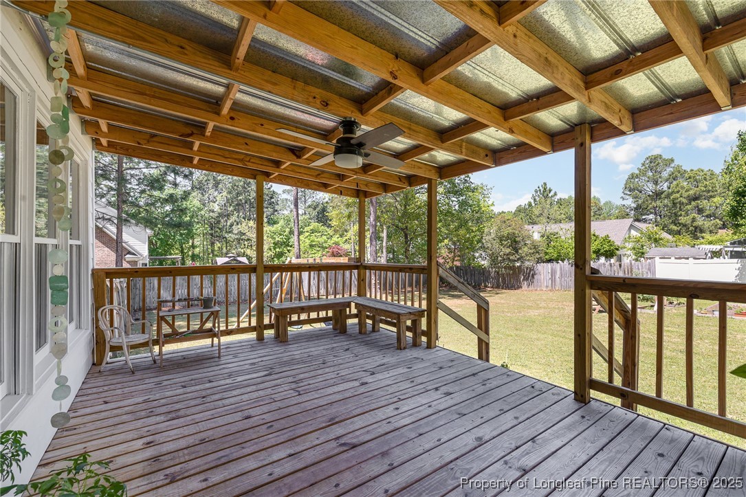 7810 Shuttle Road Fayetteville, NC 28311 - Photo 19 of 25 a view of outdoor space with wooden deck