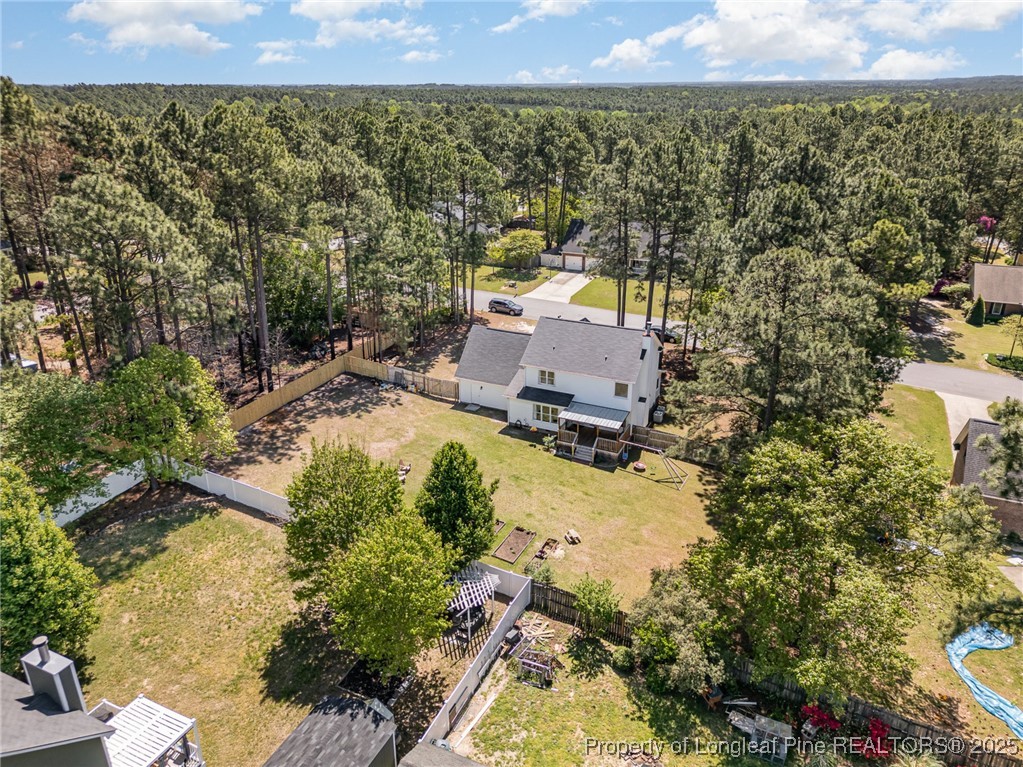 7810 Shuttle Road Fayetteville, NC 28311 - Photo 24 of 25 a view of a terrace with a garden