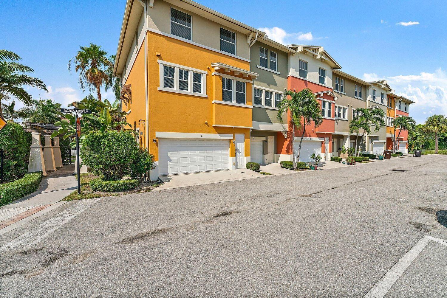500 Pacific Grove Drive, Unit 8 West Palm Beach, FL 33401 - Photo 21 of 35 a front view of a building with a street