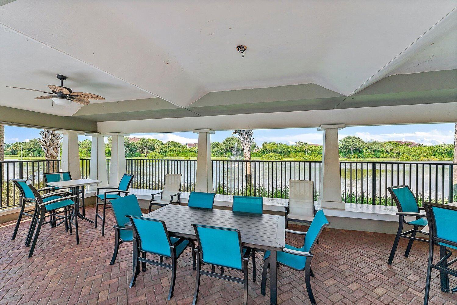 500 Pacific Grove Drive, Unit 8 West Palm Beach, FL 33401 - Photo 24 of 35 a view of a dining room with furniture window and outside view