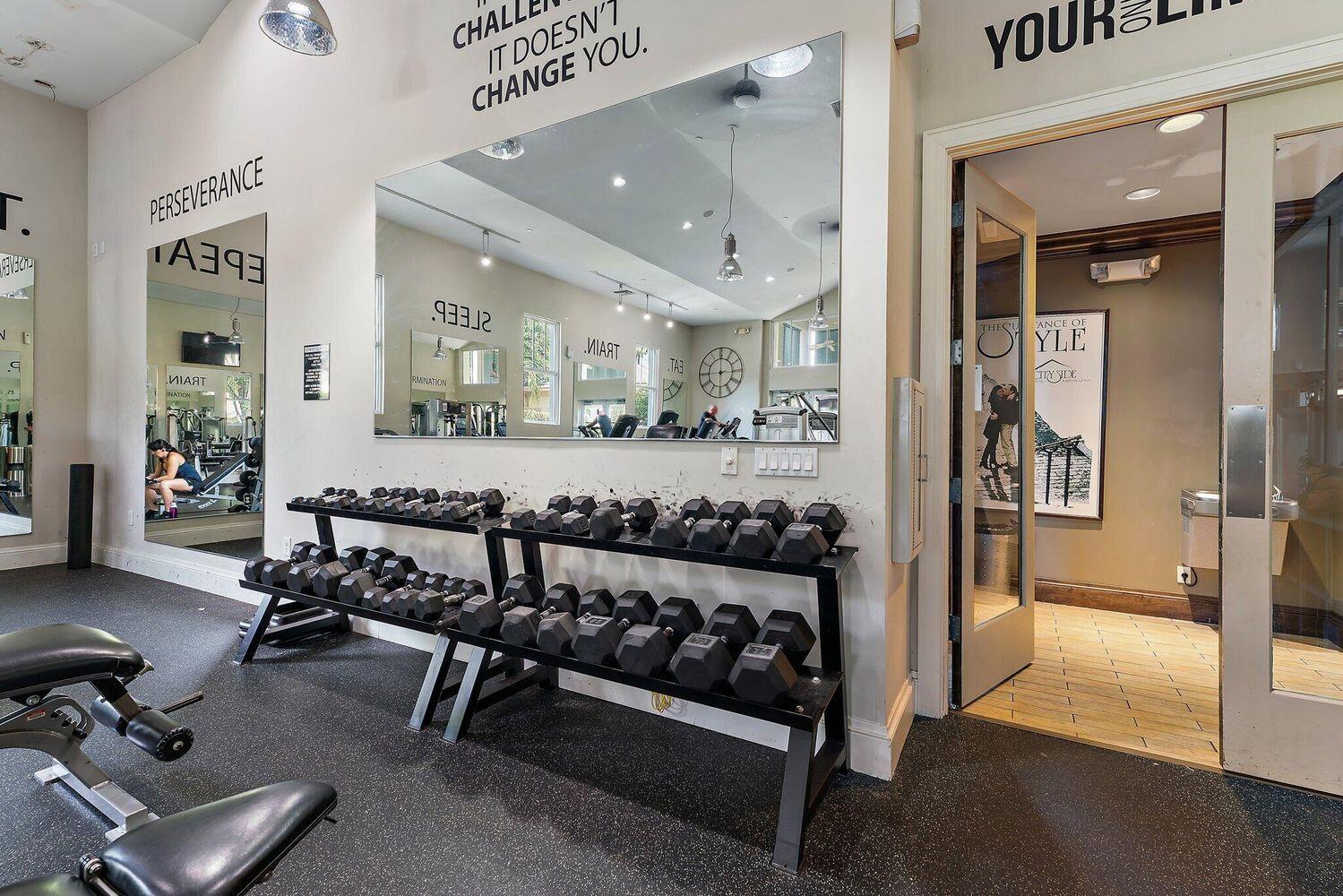 500 Pacific Grove Drive, Unit 8 West Palm Beach, FL 33401 - Photo 26 of 35 a living room with furniture and a wooden floor