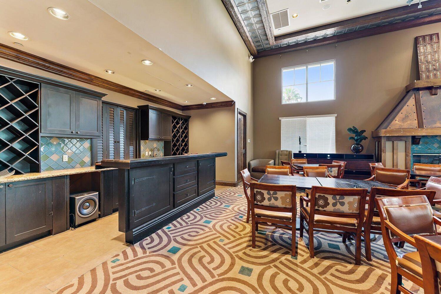 500 Pacific Grove Drive, Unit 8 West Palm Beach, FL 33401 - Photo 29 of 35 a view of a dining room with furniture
