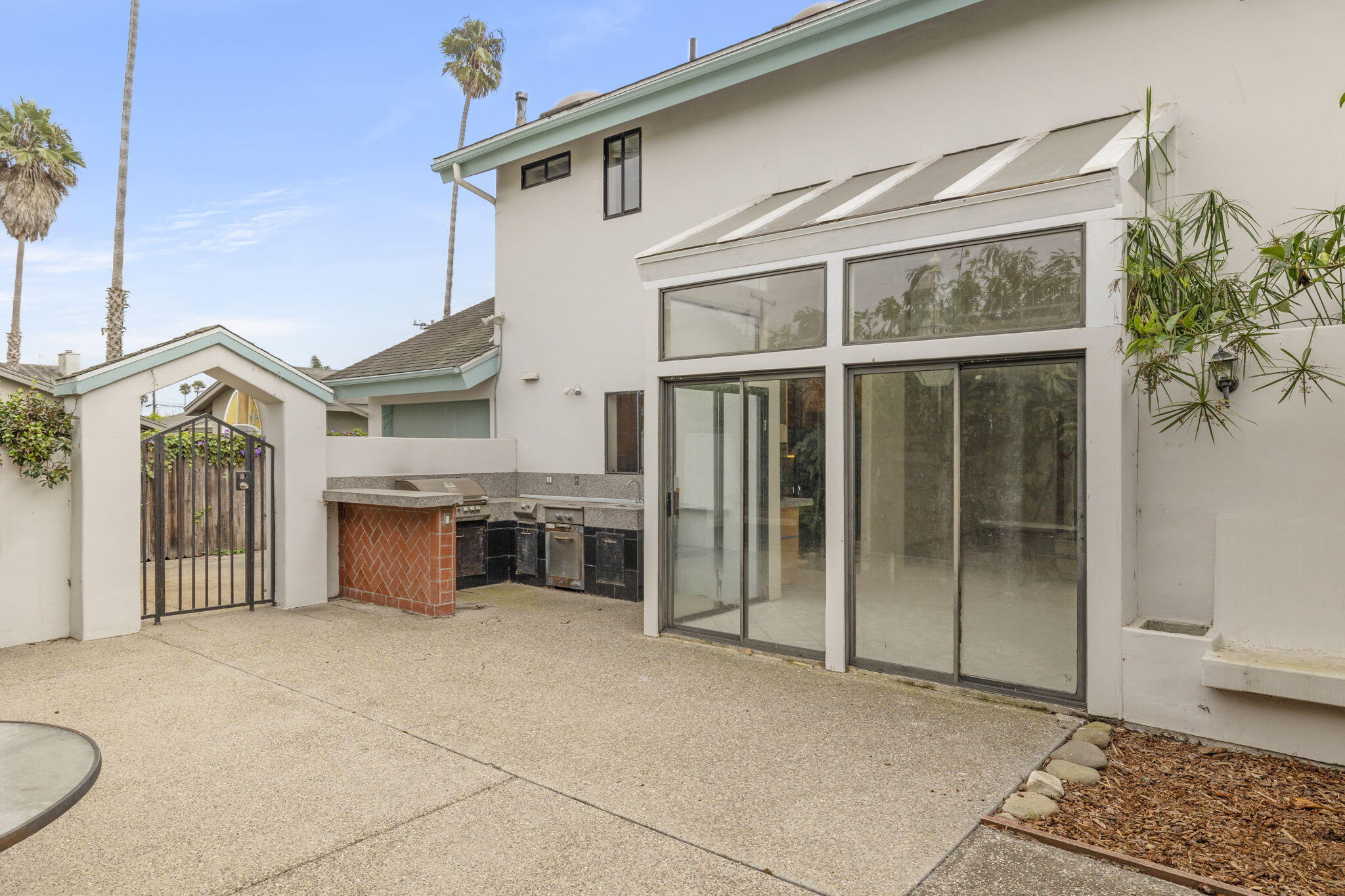 6870 Trigo Road Goleta, CA 93117 - Photo 6 of 25 a view of a house with a balcony and entryway