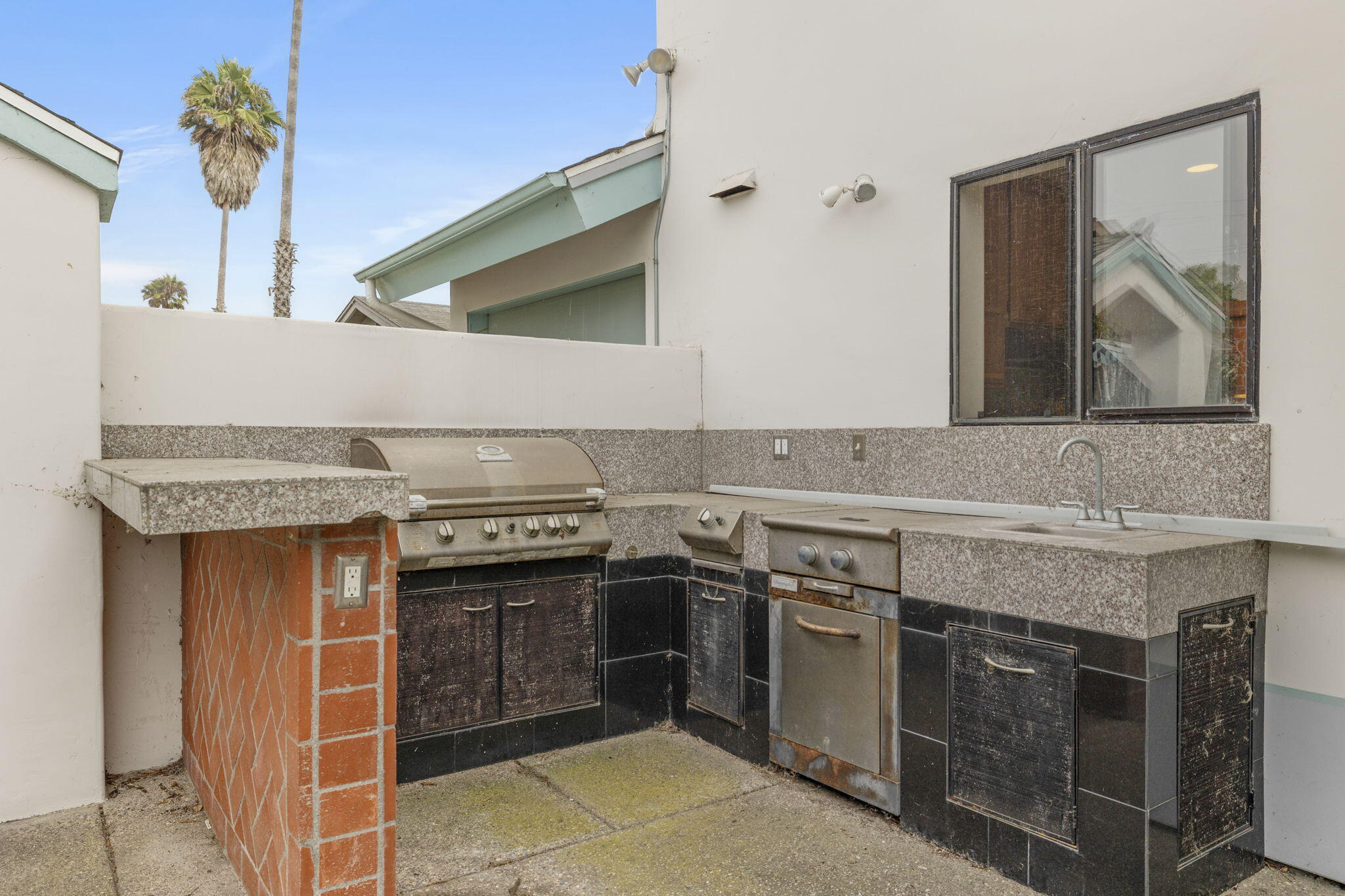 6870 Trigo Road Goleta, CA 93117 - Photo 8 of 25 a kitchen with a stove and a sink