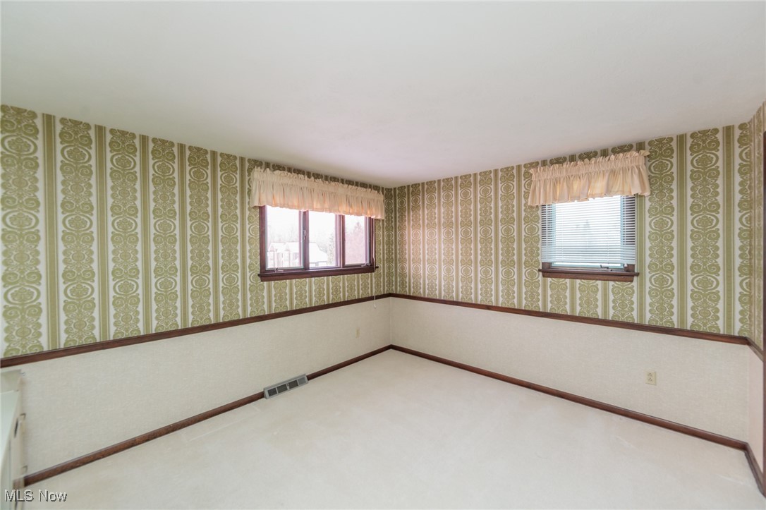4127 Huffman Road Medina, OH 44256 - Photo 28 of 49 Empty room featuring carpet flooring and wallpapered walls