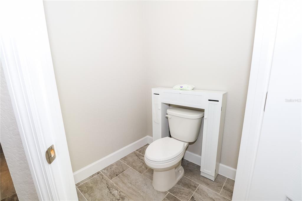 10396 Southwest 45th Avenue Ocala, FL 34476 - Photo 5 of 18 a bathroom with a toilet
