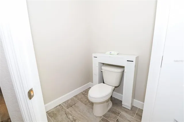 a bathroom with a toilet
