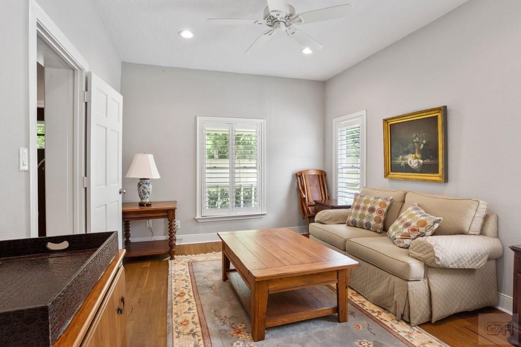 14009 West Hughes Road Dickinson, TX 77539 - Photo 20 of 54 a living room with furniture and a window