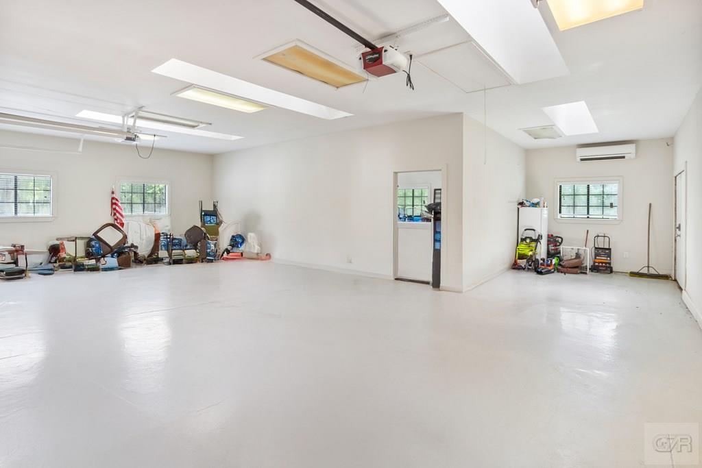 14009 West Hughes Road Dickinson, TX 77539 - Photo 30 of 54 a view of a room with gym equipment