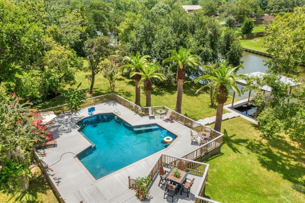14009 West Hughes Road Dickinson, TX 77539 - Photo 33 of 54 a view of yard with swimming pool