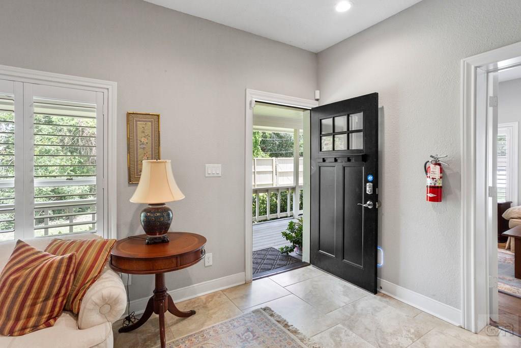 14009 West Hughes Road Dickinson, TX 77539 - Photo 4 of 54 a view of a livingroom with furniture and a window