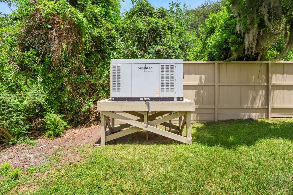 14009 West Hughes Road Dickinson, TX 77539 - Photo 46 of 54 a view of a bench in the garden